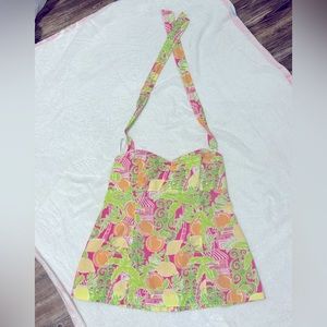 Cute Lilly top,ties at neck.Boning,zips all the way down. Pairs w/ lime, fuschia